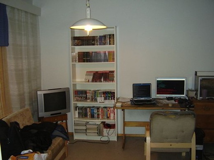 Wizardly coding center. Everything is more or less reachable from the chair (fridge is directly to right).